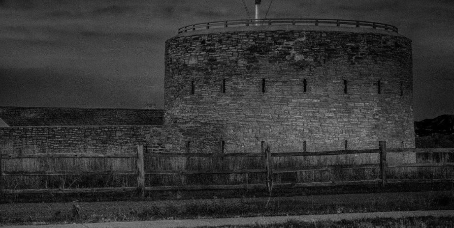 Round tour at Fort Snelling in dark black and white photo